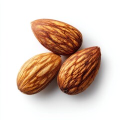 Three delicious almonds artfully arranged, showcasing their texture and natural beauty. Their color evokes a feeling of warmth and wholesomeness