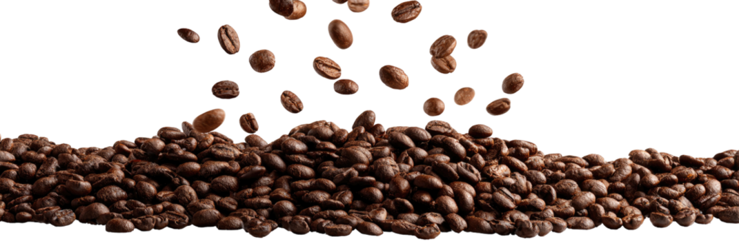 Coffee beans falling onto a pile of coffee beans