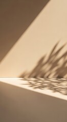 Soft natural light and leaf shadows on a minimalist beige background