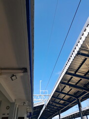 Fototapeta premium at the train station on a sunny day