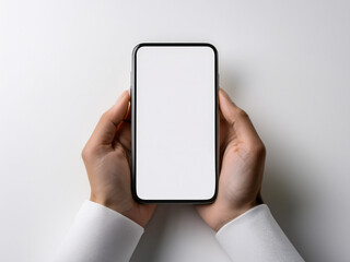 Smartphone in hand with blank screen and clean backdrop
Mobile device held against neutral background for UI design