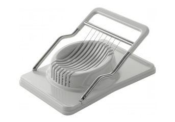 White plastic vegetable slicer with adjustable blades and handle on black background, versatile kitchen tool for slicing, julienning, or chopping vegetables with ergonomic design