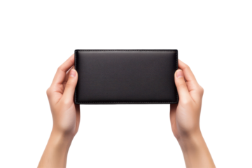 Hands holding a textured black wallet isolated on transparent background. Empty black wallet in male hands isolated on white background.