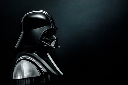 Closeup of Darth Vader action figure character from the Star Wars movie saga and space for text. Illustrative editorial