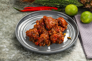 Manchurian chicken with pepper and garlic