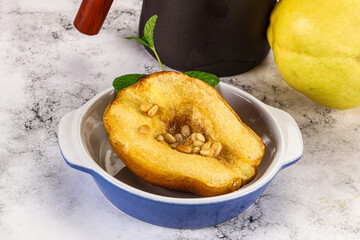 Baked quince with honey and cedar