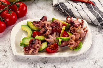 Salad with baby octopus and avocado