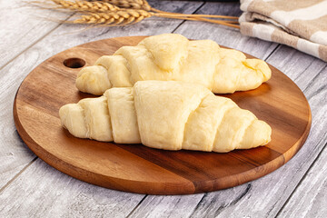 Raw uncooked croissant for bake