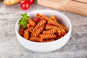 Italian fusilli pasta with tomatoes