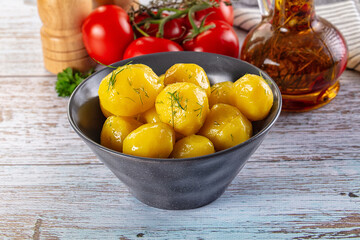 Boiled young potato with oil