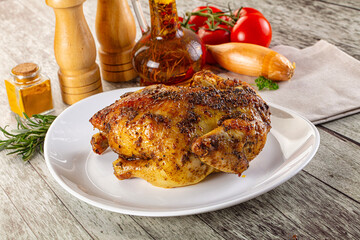 Baked in oven whole chicken with spices