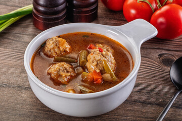 Tomato Soup with meatballs and vegetables