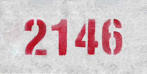 number 2146 . Red spray paint the white wall