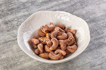 Unpeeled cashew nuts in the bowl