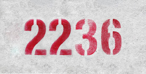 number 2236 . Red spray paint the white wall