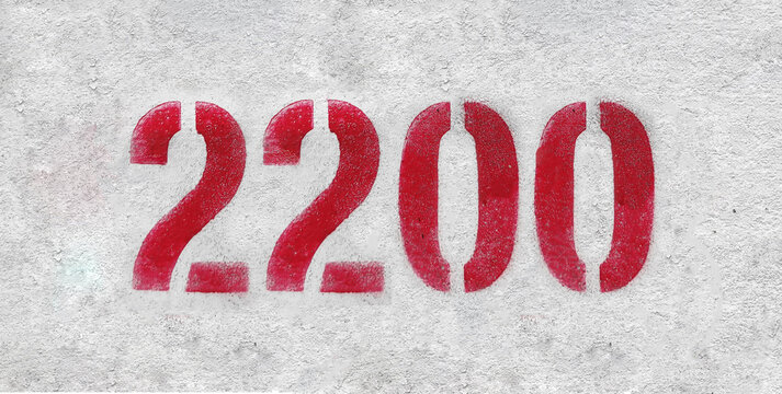number 2200 . Red spray paint the white wall