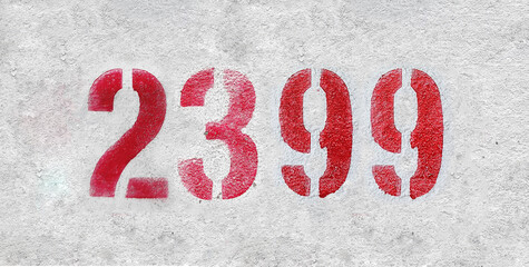 red spray-painted number 2399 sprayed onto a white wall.