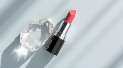 Elegant pink lipstick with sparkling crystal heart and soft light shadows