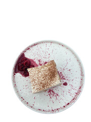 Gourmet Tiramisu Dessert on Artistic White Plate with Cocoa Powder and Berry Sauce Splash – Elegant Minimalist Food Presentation