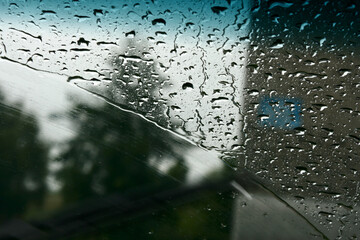 Water drops on the glass of car