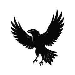 Obraz premium Striking black silhouette of a crow in full flight with wings extended