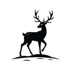 Elegant black silhouette of a reindeer walking gracefully through a snowy landscape