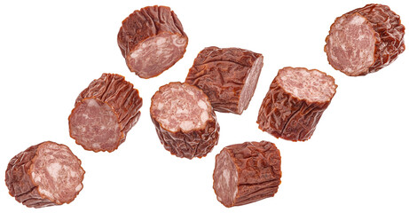 Polish kielbasa slices, chopped smoked sausage isolated on white background, full depth of field