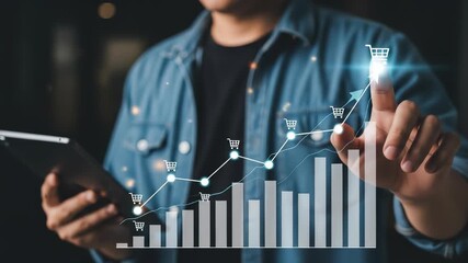 Boosting Online Sales: Man Analyzing E-Commerce Growth Chart on Tablet, Achieving Business Success with Rising Shopping Cart Trend Analysis - Powered by Adobe