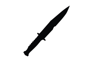A menacing black silhouette of a combat knife with a serrated blade and textured handle isolated on white background silhouette