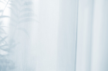 Fototapeta premium Sunlight on curtain, blurred shadow tulle background, sheer curtains, silk veil fabric