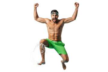 Excited man in swim shorts and goggles jumping with water splash