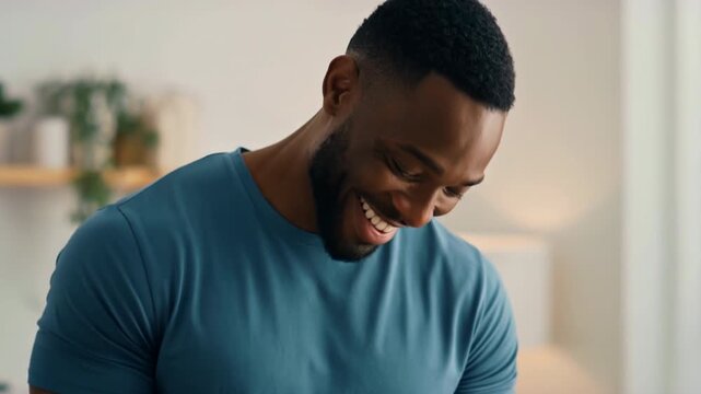 Person in teal shirt prepares healthy vegetables in kitchen, chopping fresh produce for nutritious meal prep and clean eating lifestyle