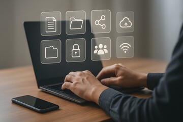 Person working on laptop with floating digital icons for file sharing cloud storage data security and wireless network