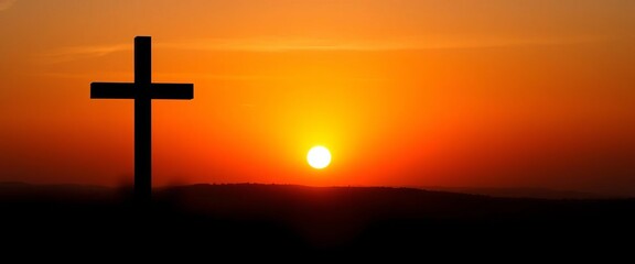 Elegant cross silhouette against sunrise backdrop, Christ, Easter