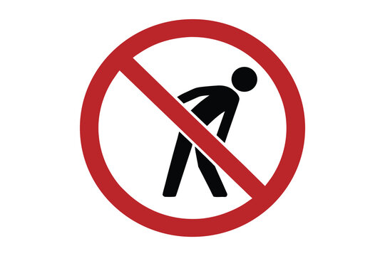 Red prohibition circle with diagonal line across a black silhouette of a person bending over isolated on white background silhouette