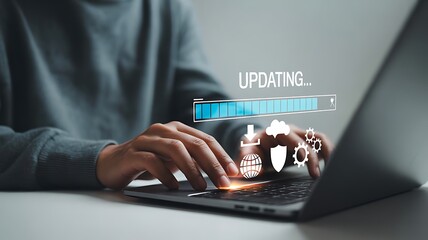 Person using laptop with digital updating progress bar and icons computer technology