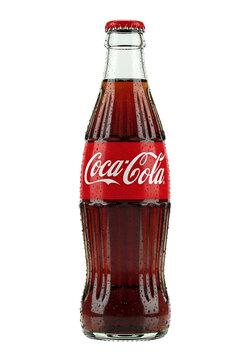 refreshing cola soft drink in iconic glass bottle for advertising

