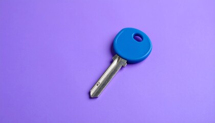Single blue key on a vibrant purple background