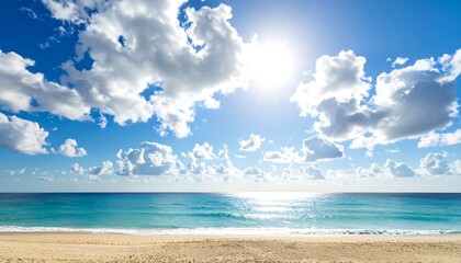 Obraz premium Sunny beach scene with bright blue sky, fluffy white clouds, and calm turquoise ocean