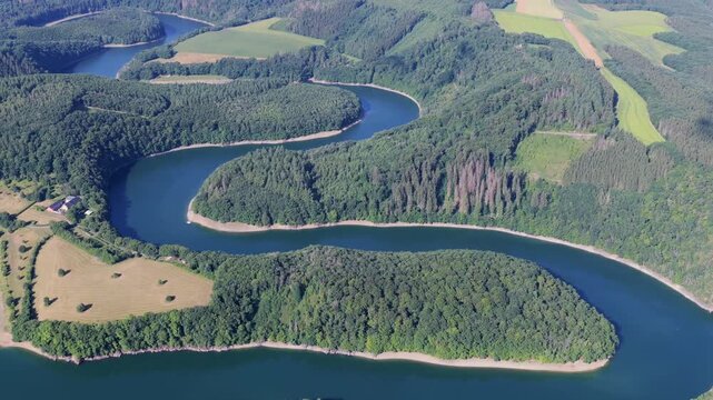 Aerial view of Upper S&ucirc;re Lake in Luxembourg during summer 