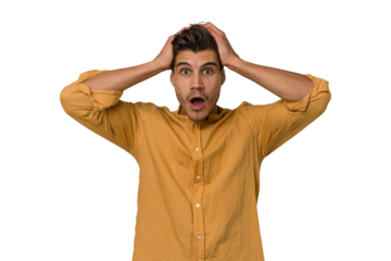 Young handsome caucasian man isolated on white background surprised and shocked.
