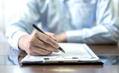 Business man employer holding resume hiring recruit looking cv resume to hire candidates, analyzing information before job interview. Recruitment concepts