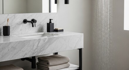 Modern bathroom featuring a marble vanity with black fixtures and minimalist design