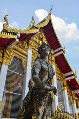 Old Thai Angel Statue and Chapel, Symbols of Buddhism, Southeast Asia at Wat Chang Kam or Wat Kan Thom, Wiang Kum Kam Chiang Mai, Northern Thailand