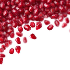 Pomegranate seeds isolated on white background