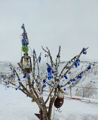 Snow covered branches; evil eyes; Cappadocia; turkey 