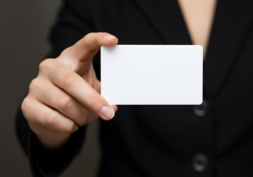 Woman Holding Blank Business Card in Black Blazer, Close-up for Branding, Marketing and Advertising Template