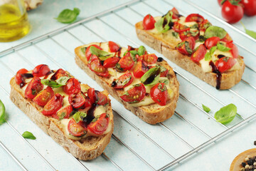 Freshly made bruschetta sandwiches - traditional dish of Italian cuisine	