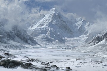 Snowy mountain range with a prominent peak under a partly cloudy sky.  Vast expanse of snow and ice