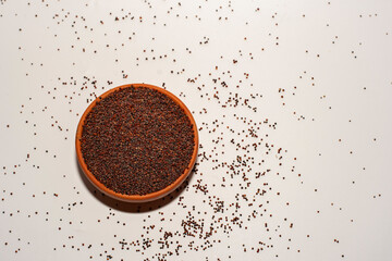 Clay Pot Filled with Ragi Finger Millet on White Background – High Fiber, Low GI Superfood